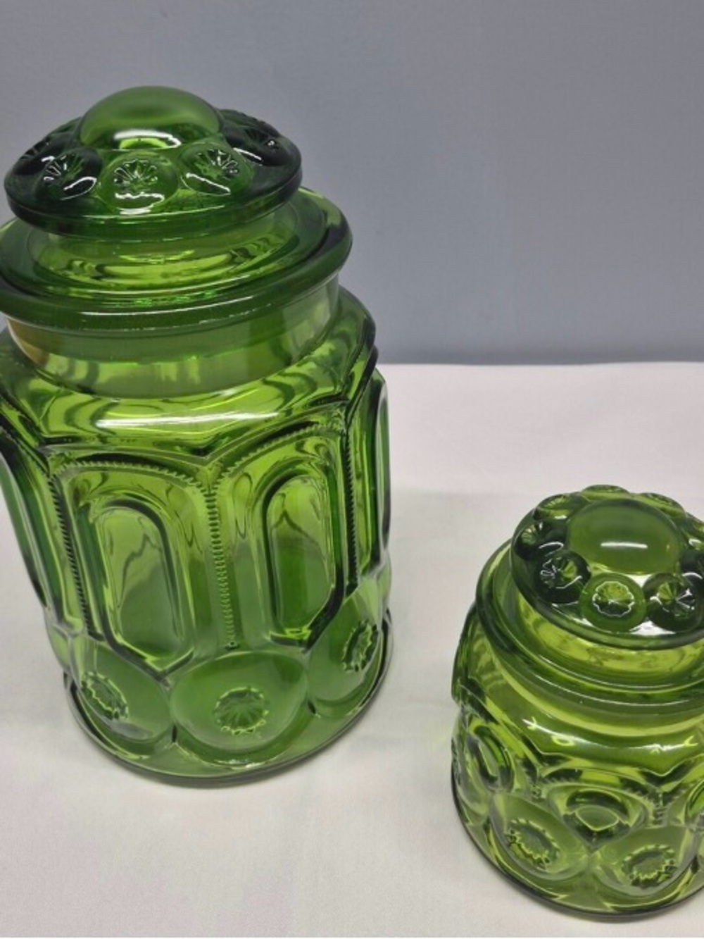 Indiana Glass Emerald Green Embossed Glass Canister Pair